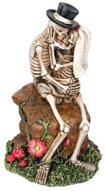 Skeleton Lovers Kissing On Rock